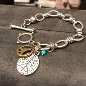 Lucky Brand bracelet with peace & happiness charms
